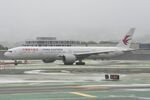 B-7882 @ KSFO - Departing runway 10, November rain, 'Pineapple Express' SFO 2024. - by Clayton Eddy