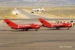 N117RH @ RTS - The Stoli MiG's at Reno in September 1999. N217JG (L) & N117RH (R). Pilots were Jerry Gallud & Randy Howell. - by Marc Van Ryssel