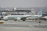 JA828J @ KSFO - Departing runway 10, November rain, 'Pineapple Express' SFO 2024. - by Clayton Eddy
