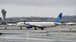 N57852 @ KSFO - Departing runway 10, November rain, 'Pineapple Express' SFO 2024. - by Clayton Eddy