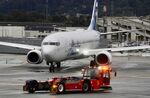 N290AK @ KSFO - Departing runway 10, November rain, 'Pineapple Express' SFO 2024. - by Clayton Eddy