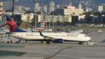 N377DA @ KLAX - Getting towed to gate at LAX - by ToddRoyer