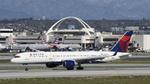N555NW @ KLAX -  Arriving at Lax on 25L - by ToddRoyer