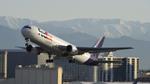N130FE @ KLAX - Departing LAX on 25R - by ToddRoyer