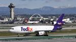 N375FE @ KLAX - Taxiing to Maintenance at LAX - by ToddRoyer