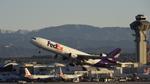 N593FE @ KLAX - Departing LAX on 25R - by ToddRoyer