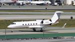 N415QS @ KLAX - Taxiing for departure at LAX - by ToddRoyer