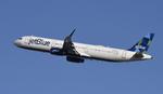 N943JT @ KLAX - Departing LAX on 25R - by ToddRoyer