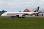 9V-SMT @ EGCC - Manchester - by Chris Hall