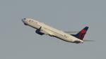 N897DN @ KLAX - Departing LAX on 24L - by ToddRoyer