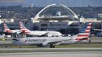N936AN @ KLAX - Arriving at LAX on 25L - by ToddRoyer