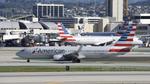 N936AN @ KLAX - Arriving at LAX on 25R - by ToddRoyer