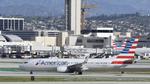 N977NN @ KLAX - Arriving at LAX on 25L - by ToddRoyer