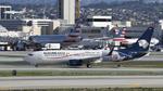 XA-AME @ KLAX - Arriving at LAX on 25L - by ToddRoyer
