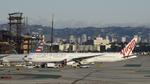 VH-VPF @ KLAX - Getting towed to parking at LAX - by ToddRoyer