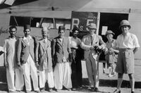 G-EBTS - Spider and crew in later years in India. My father Charles Ernest Jones is the one sitting in the doorway of the Spider - by Unknown