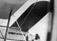 G-EBTS - Shot of Spider flying  from a biplane in close formation (I believe a Gypsy Moth) in Spider's later years in India - by Charles Ernest Jones