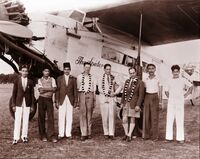 G-EBTS - The Spider with crew in India in the aircraft's later years in India. My father is 4th from the left one of 3 with garlands around his neck - by unknown