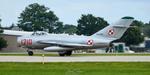 N717MG @ KOSH - MIG-17 departing - by topgunphotography
