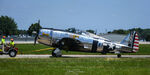 N4747D @ KOSH - P-47D being towed to the center ramp - by Topgunphotography