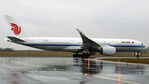 B-32DL @ LOWW - Rolling down runway 29 in rainy weather - by Hotshot