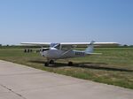 N6091G - Sitting in the grass - by Floyd Taber