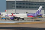 B-LEB @ HKG - Parked at Hong Kong International - by Chris Holtby