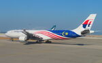 9M-MTA @ HKG - Taxiing for take-off at Hong Kong International - by Chris Holtby