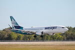 C-FIBA @ KRSW - WestJet Flight 1236 arrives on Runway 24 at Southwest Florida International Airport follow flight from Toronto-Pearson International Airport