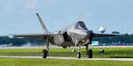 20-5585 @ KOSH - F-35A Demo taxiing by the crowd line - by Topgunphotography