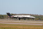 N475FX @ KRSW - Learjet 475FX arrives on Runway 6 at Southwest Florida International Airport following flight from Teterboro Airport