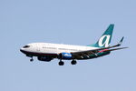 N344AT @ KSRQ - AirTran Flight 696 on approach to Runway 32 at Sarasota-Bradenton International Airport - by Suncoast Spotter
