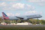 N587UW @ KRSW - American Flight 1094 arrives on Runway 6 at Southwest Florida International Airport following flight from Charlotte-Douglas International Airport