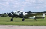 G-AFTL @ EGSU - Lockheed 12A Electra Junior at Duxford airfield (two days after Duxford Flying Day: The Americans 2024) - by Ingo Warnecke