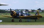 G-TSIX @ EGSU - North American AT-6C Harvard II A at Duxford airfield (two days after Duxford Flying Day: The Americans 2024) - by Ingo Warnecke