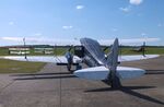 G-AKIF @ EGSU - De Havilland D.H.89A Dominie/Dragon Rapide at Duxford airfield (two days after Duxford Flying Day: The Americans 2024) - by Ingo Warnecke