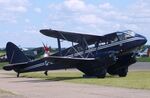 G-AKIF @ EGSU - De Havilland D.H.89A Dominie/Dragon Rapide at Duxford airfield (two days after Duxford Flying Day: The Americans 2024) - by Ingo Warnecke