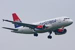 YU-APF @ EGLL - Heathrow - by Chris Hall