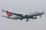 TC-JOM @ EGLL - Heathrow - by Chris Hall