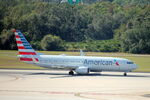 N977NN @ KTPA - American Flight 2714 departs Runway 1L at Tampa International Airport enroute to Dallas/Fort Worth International Airport - by Suncoast Spotter