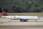 N108DN @ KTPA - Delta Flight 1182 taxis to gate at Tampa International Airport following flight from Minneapolis-St Paul International Airport