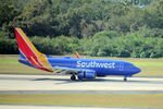 N7832A @ KTPA - Southwest Flight 2939 arrives on Runway 1L at Tampa International Airport following flight from Reagan National Airport - by Suncoast Spotter