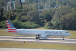 N970UY @ KTPA - American Flight 1414 departs Runway 1L at Tampa International airport enroute to Charlotte-Douglas International Airport - by Suncoast Spotter