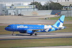 N566JB @ KTPA - JetBlue Flight 1365 departs Runway 1R at Tampa International airport enroute to Cancun International Airport