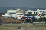 9M-MAC @ EGLL - Heathrow - by Chris Hall