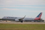 N125AA @ KRSW - American Flight 873 arrives on Runway 6 at Southwest Florida International Airport following flight from Dallas-Fort Worth International Airport - by Suncoast Spotter