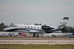 N334PM @ KRSW - Jet Linx Flight 334 arrives on Runway 6 at Southwest Florida International Airport following flight from Flying Cloud Airport