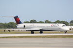 N940DL @ KSRQ - Delta MD-88 taxis to gate at Sarasota-Bradenton International Airport - by Suncoast Spotter