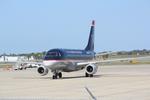N801MA @ KSRQ - Republic Airlines/US Airways Express Embraer 175 pulls into gate following arrival to Sarasota-Bradenton International Airport