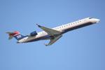 N709PS @ KSRQ - PSA Airlines/US Airways Express CRJ-700 departs from Runway 14 at Sarasota-Bradenton International Airport - by Suncoast Spotter